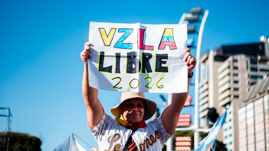Venezuelan community in Buenos Aires celebrates freedom with signs and flags.
